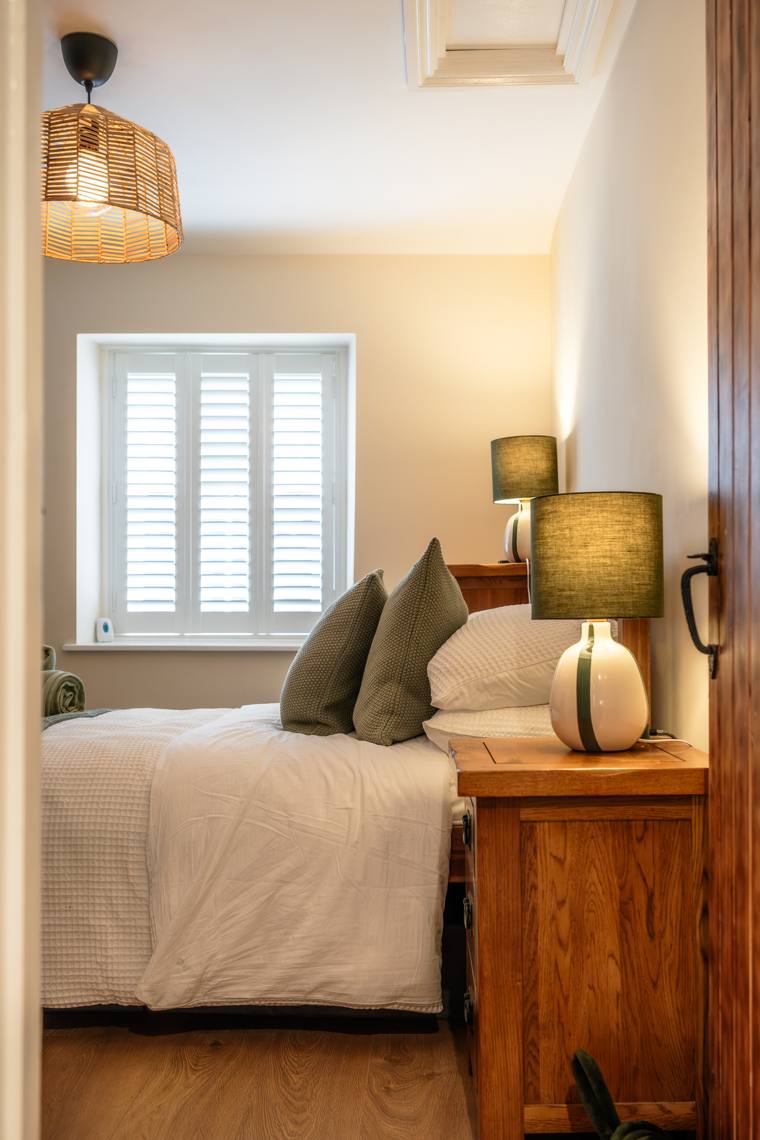 The double bedroom at No. 48 Magdalene Street — a real bed for Glastonbury Festival 2027, ten minutes from the site