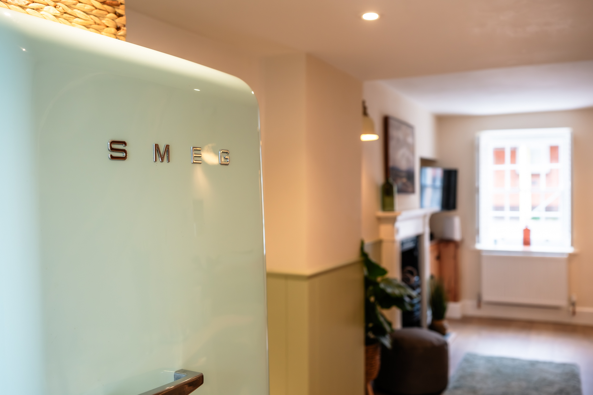 Pastel green Smeg fridge in the kitchen at No. 48 Magdalene Street